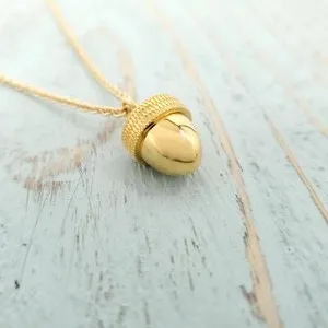 Authentic Golden Acorn Capsule: Mystic Pendant of Growth & Protection