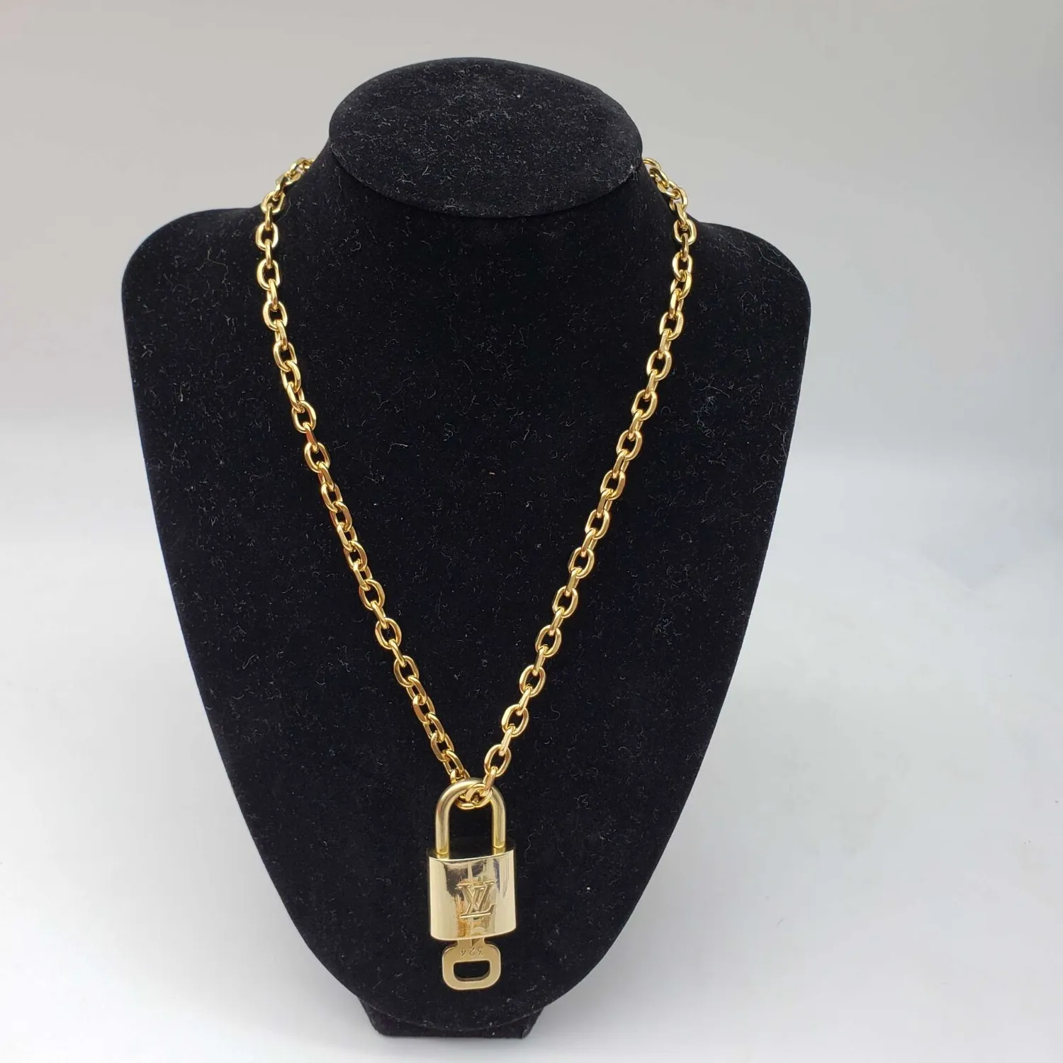 Authentic Golden Guardian: Louis Vuitton Lock & Key Amulet
