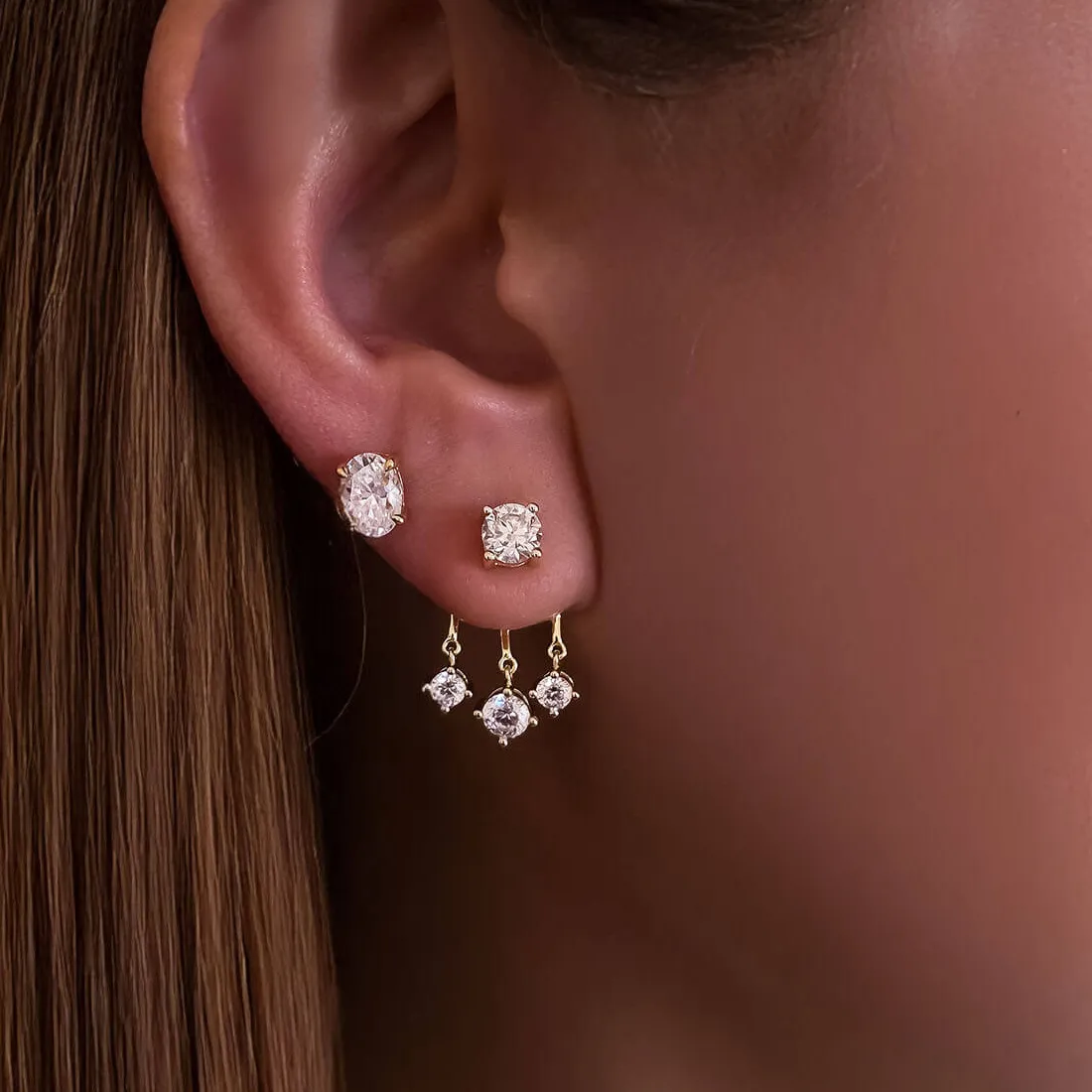 Authentic Luminous Geometry: Celestial Zircon Studs in Radiant Gold