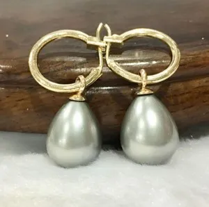 Authentic Celestial Tides Dangle Earrings: Radiant Gold-Plated South Sea Shell Pearls