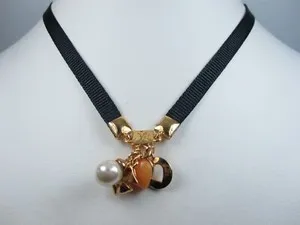 Authentic The Gilded Enigma: Nina Ricci Gold-Plated Enamel and Pearl Talisman