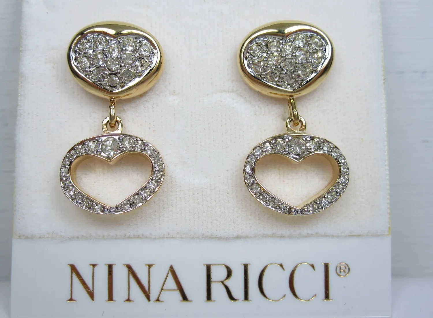 Authentic Celestial Radiance: Nina Ricci Gold-Plated Crystal Talismans