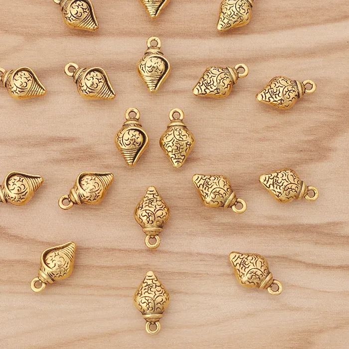 Authentic Trove Of Sea Conch Talismans 30 Antique Gold Spiral Charms For Sacred Jewelry Crafting