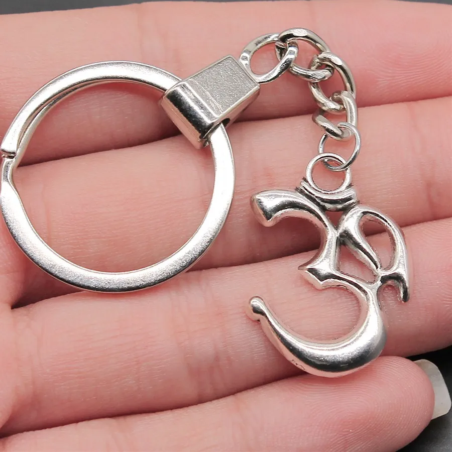 Authentic Om Radiance Dual- Tone 28X22 Mm Keychain