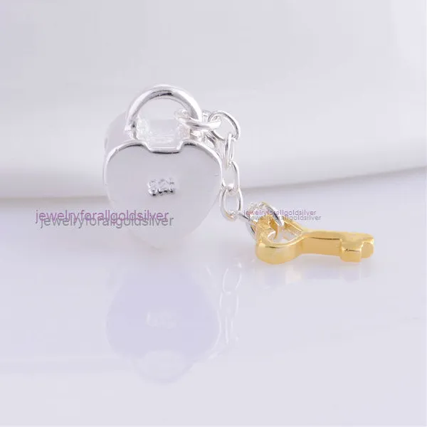Authentic Heart of Love and Protection: A Sterling Silver Lock with Gold Plated Key