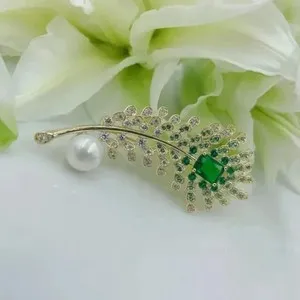 Authentic 2.30Ct Emerald Cut Lab Created Emerald Feather Brooch Pin 14K Yellow Gold Plated
