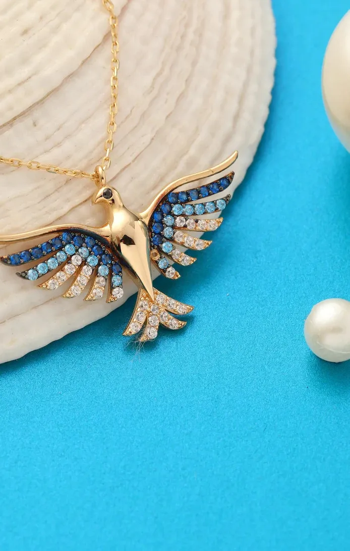 Authentic Phoenix Ascendant: Majestic 1.25 Ct Blue Topaz Pendant in 14K Yellow Gold Plated Radiance