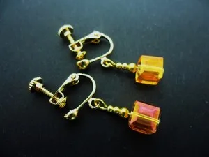 Authentic Geometric Harmony: The Sacred Cube Clip-On Talismans