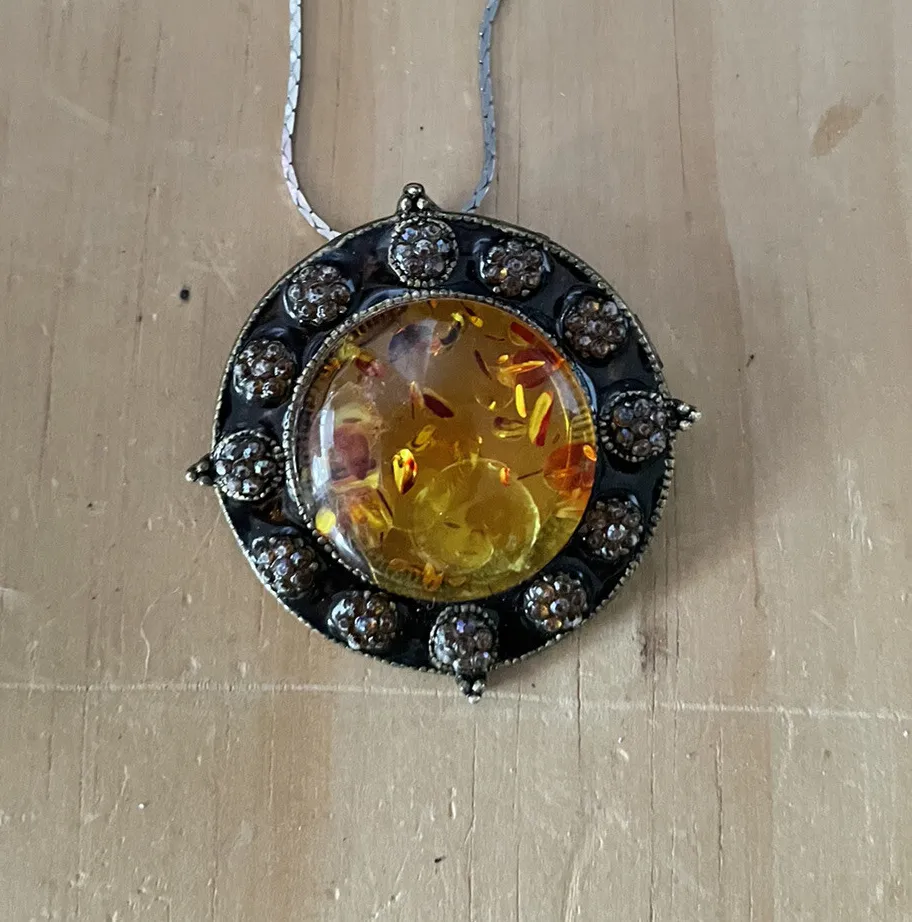 Authentic Amber Heart Guardian: Protective Elegance on Your Chest