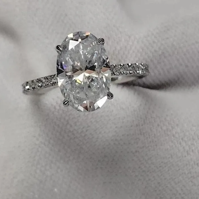 Authentic 4.10 TCW Oval Cut Moissanite Hidden Halo Engagement Ring 14K White Gold Plated