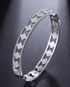 Authentic Celestial Four-Leaf Clover Moissanite Bangle in 14K White Gold