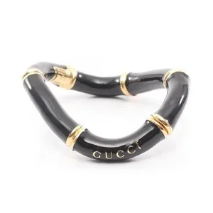 Authentic Golden Bamboo Cuff: Black Shield for the Modern Woman
