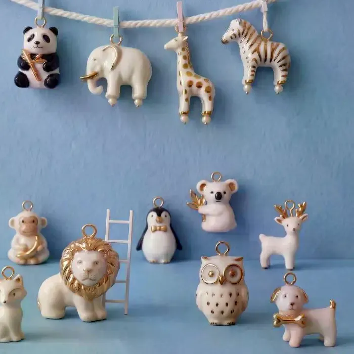 Authentic Celestial Menagerie: Gold-Plated Lion, Elephant & Raccoon Charms