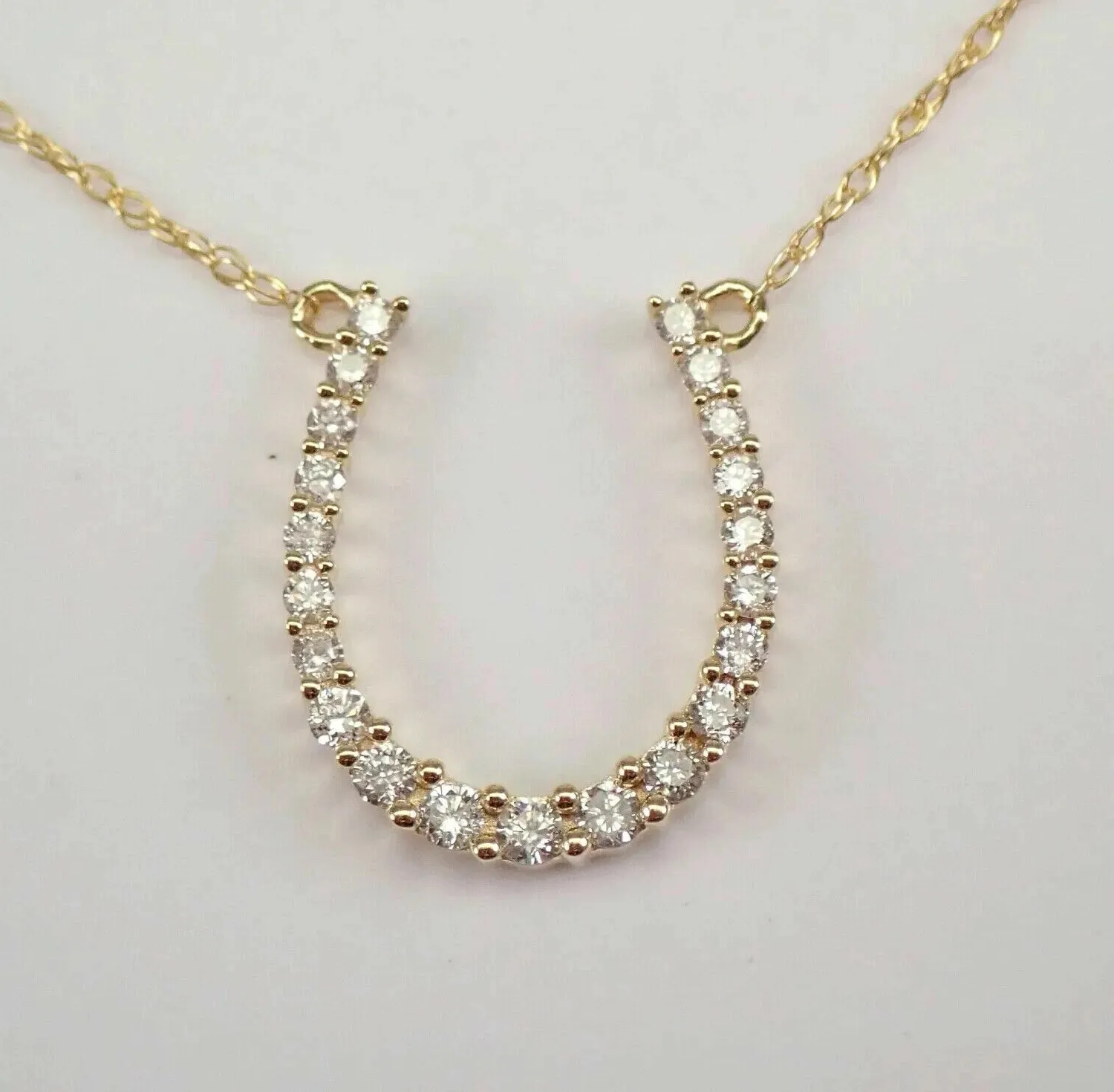 Authentic Horseshoe Halo: 2‑Ct Simulated Diamond Pendant in 14K Golden Protection