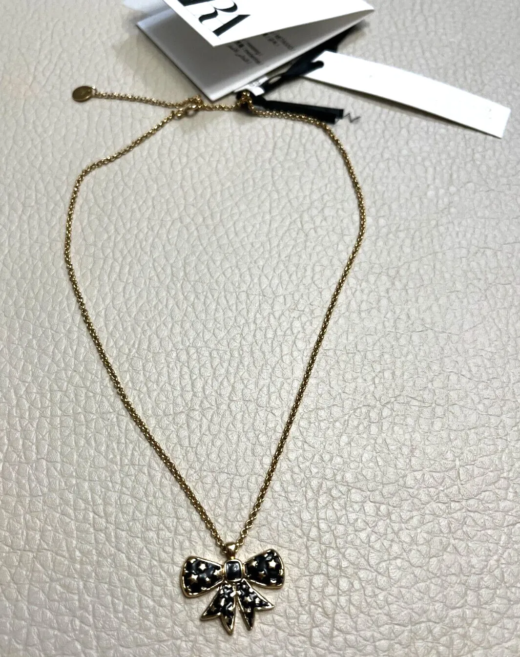 Authentic Mystic's Embrace The Enchanted Bow Tie Amulet