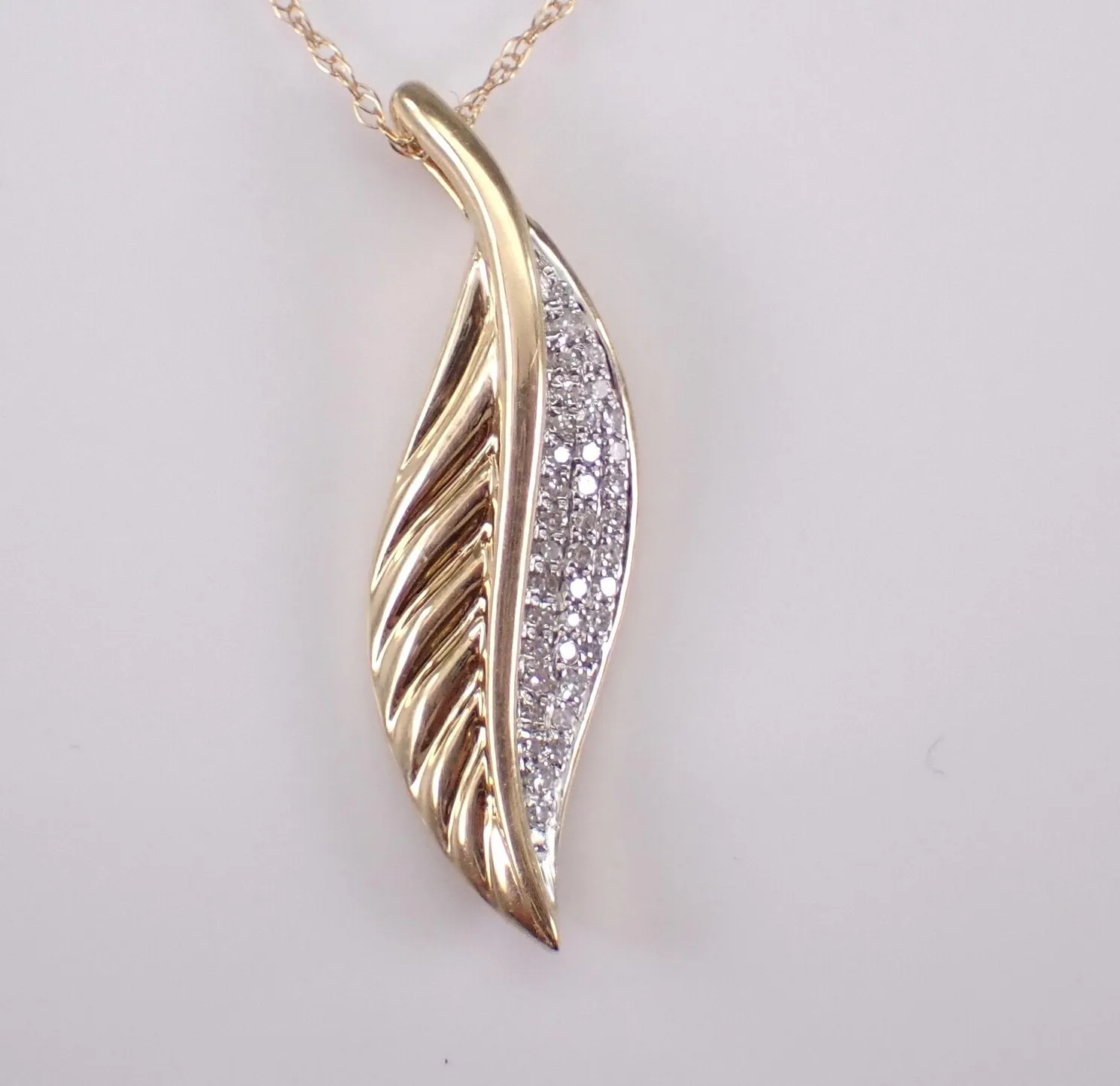 Authentic Feather Of Grace Moissanite's Celestial Dance