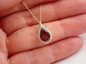 Authentic Crimson Halo Pendant: Pear‑Shaped Garnet in 14K Gold