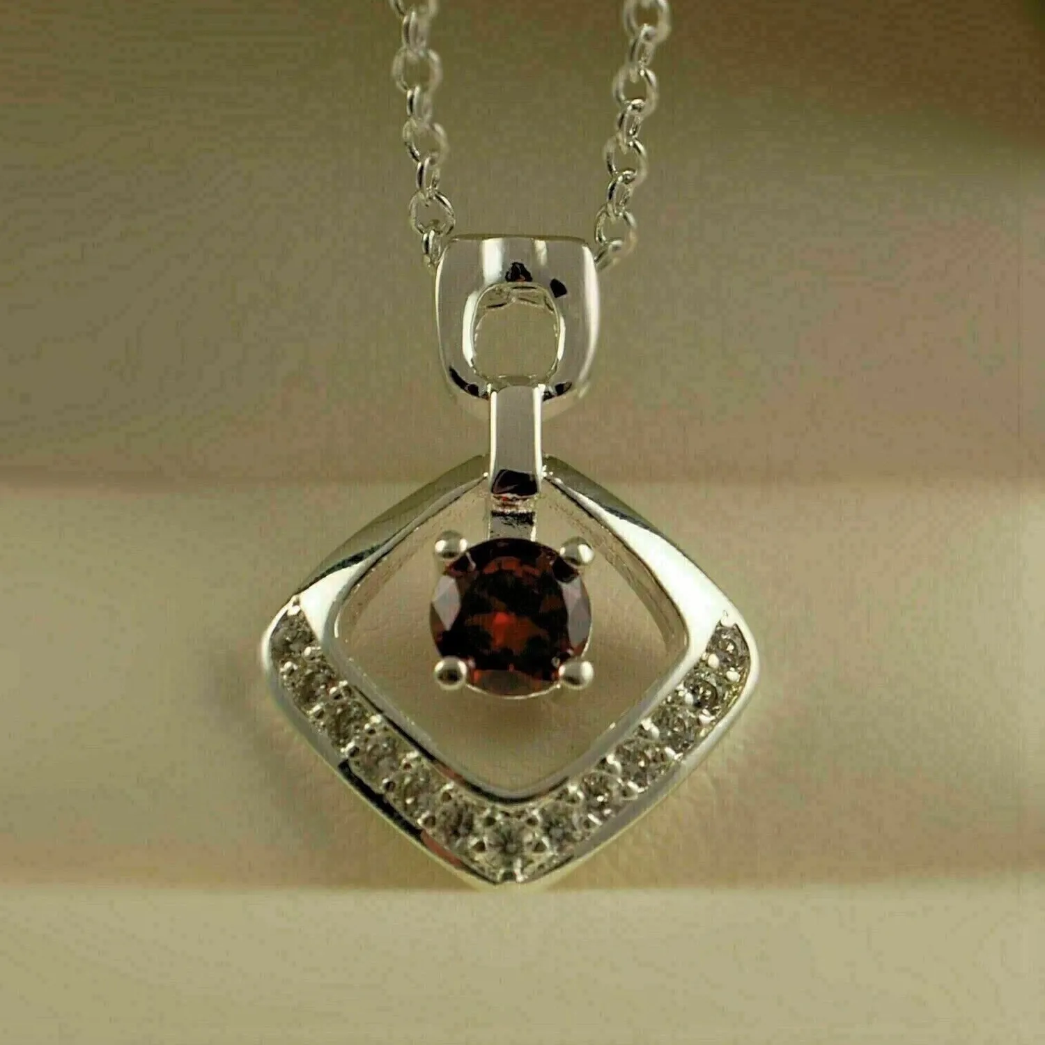 Authentic Crimson Heart of the Phoenix – 2‑Carat Simulated Garnet Charm in 14K White‑Gold Plating