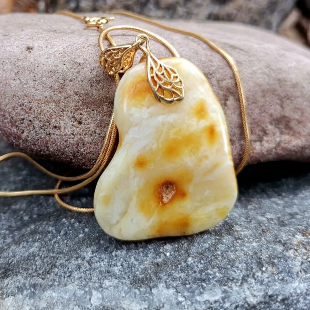 Authentic Celestial Radiance: The Sacred Baltic Amber Solar Talisman