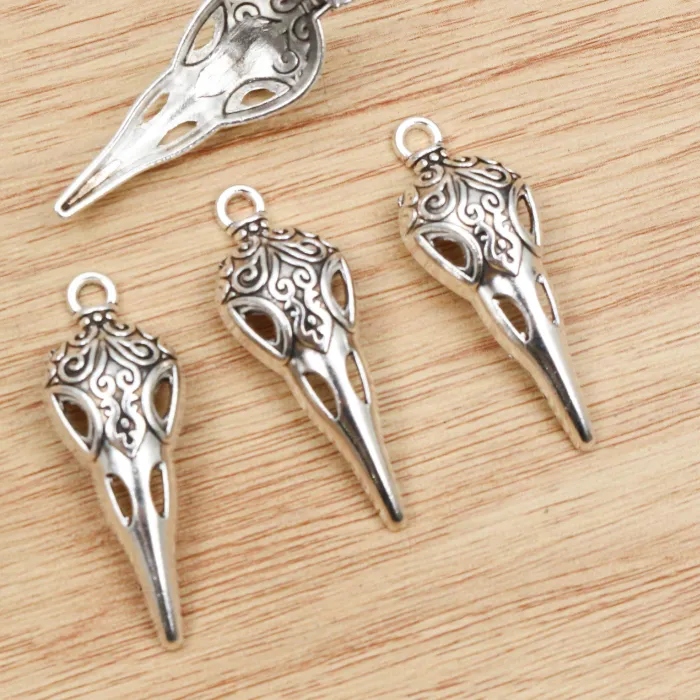 Authentic Whispering Aviary Talisman: 15-Piece Antique Silver Bird Skull Charms
