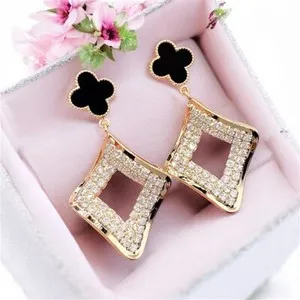 Talisman Of Fortune The Gold- Plated Four- Leaf Clover And Sacred Spade Earrings