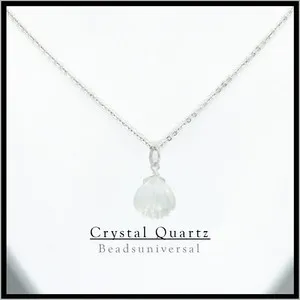 Authentic Shell of Serenity: Amplify Your Chakras with this Luminous Crystal Pendant