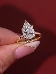 Authentic Radiant Tear of the Cosmos Pear Moissanite Solitaire Ring