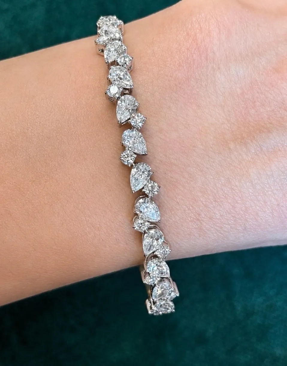 Authentic 6.85 Ctw Pear Cut Moissanite Beautiful Oval Shape Bangle 14K Yellow Gold Plated.