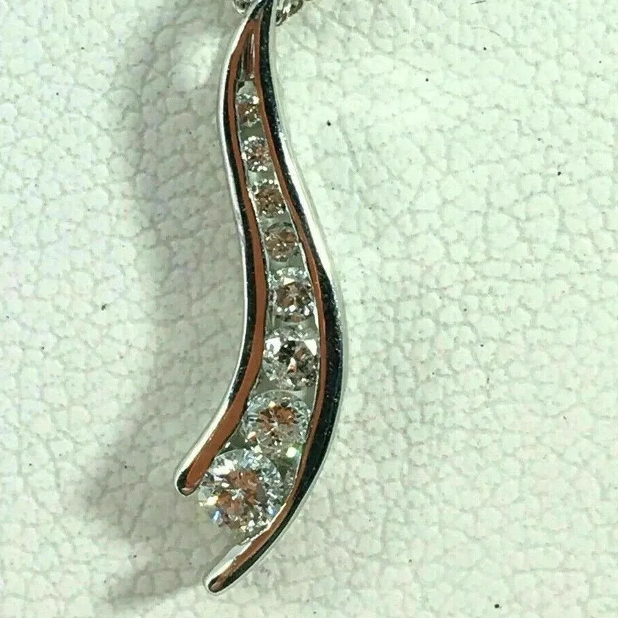 Authentic Radiant Luminescence 14K White Gold Plated Simulated Diamond Amulet