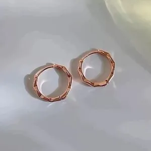 Authentic Whispering Orbits Rose Gold Twisted Huggie Hoops