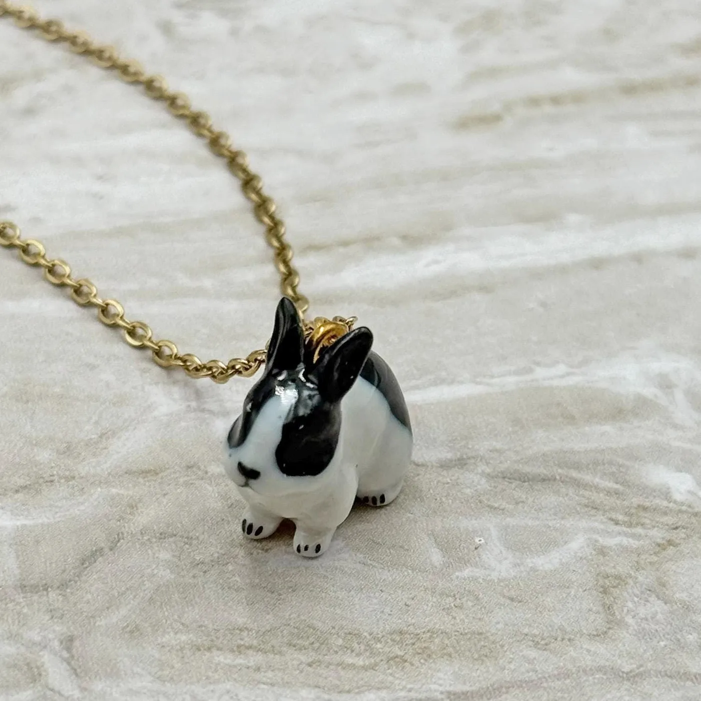 Authentic The Dual Harmony Hare Talisman In Gilded Embrace