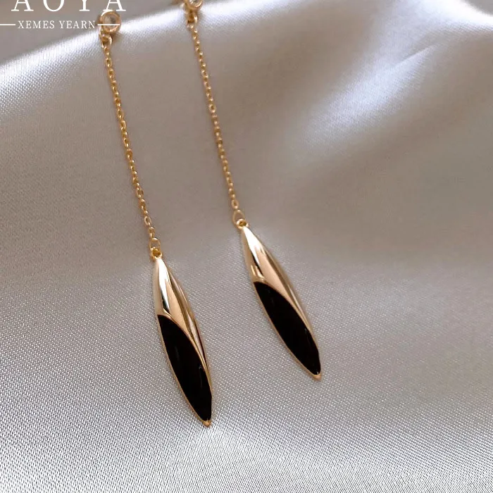 Authentic Whispers of Elegance: Black Gold Tassel Earrings for the Sophisticated Soul