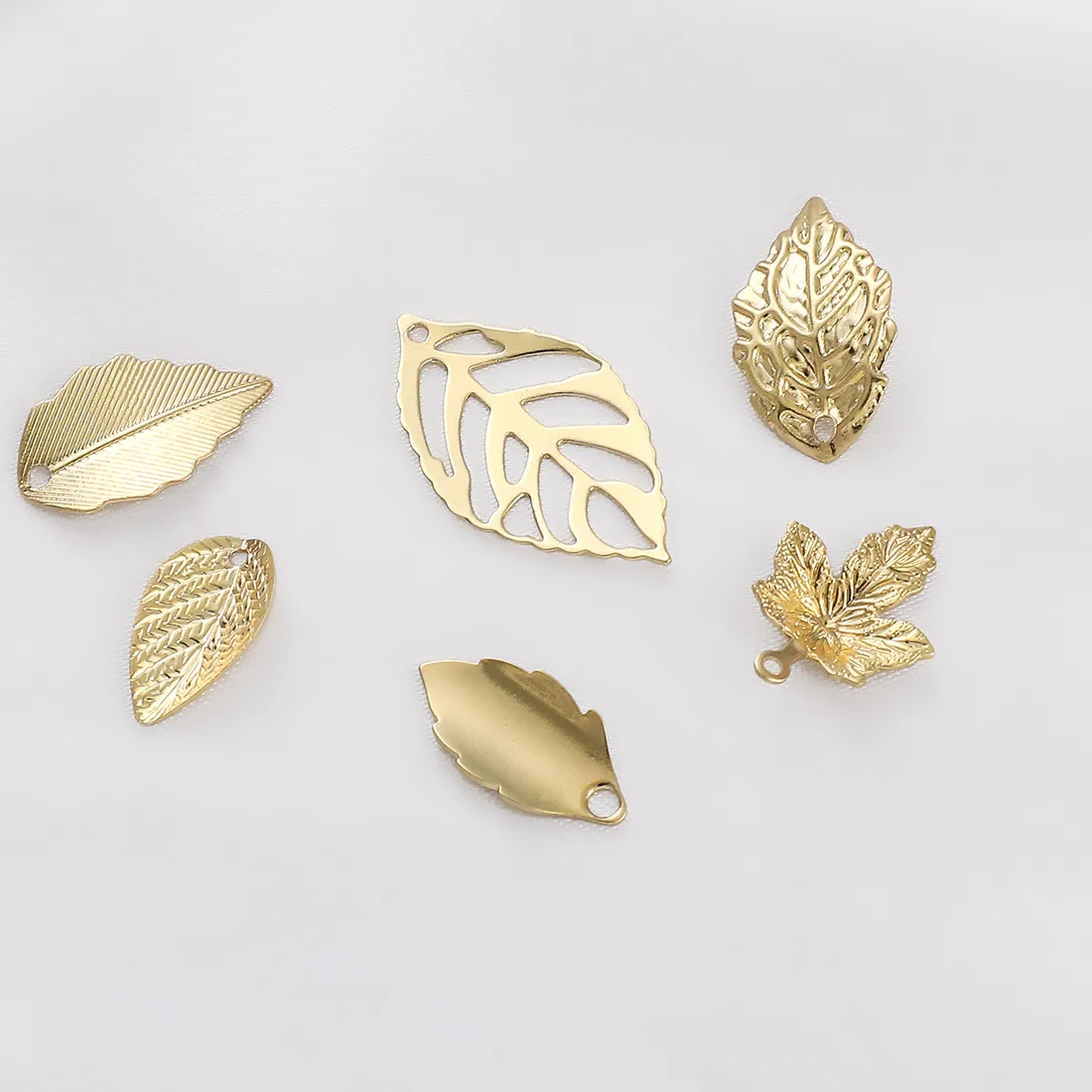 Authentic Twin Golden Leaf Talismans – 14K Gold‑Plated Brass Charms