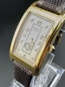 Authentic The Golden Epoch Curvex Timepiece: A Relic of Elegance and Celestial Flow