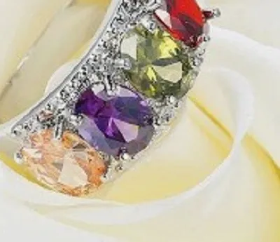Authentic The Celestial Harmony Ring of Amethyst, Peridot, and Garnet in 14KT White Gold Plate