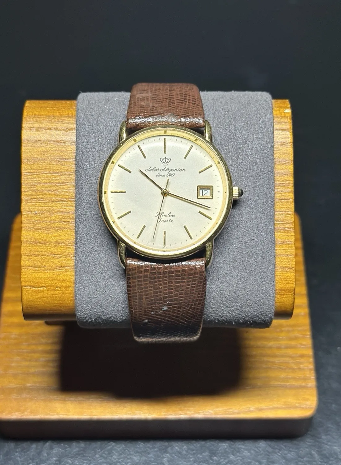 Authentic Jules Jürgensen Slimline Swiss 6142 Quartz watch features a gold-plated case
