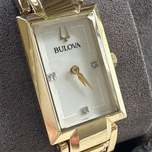 Authentic The Celestial Radiance Bangle: A Timepiece of Golden Resonance