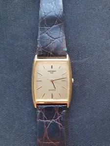 Authentic Vintage Unique Orient VX Tank Quartz Gold Plated Japan 1980s Watch