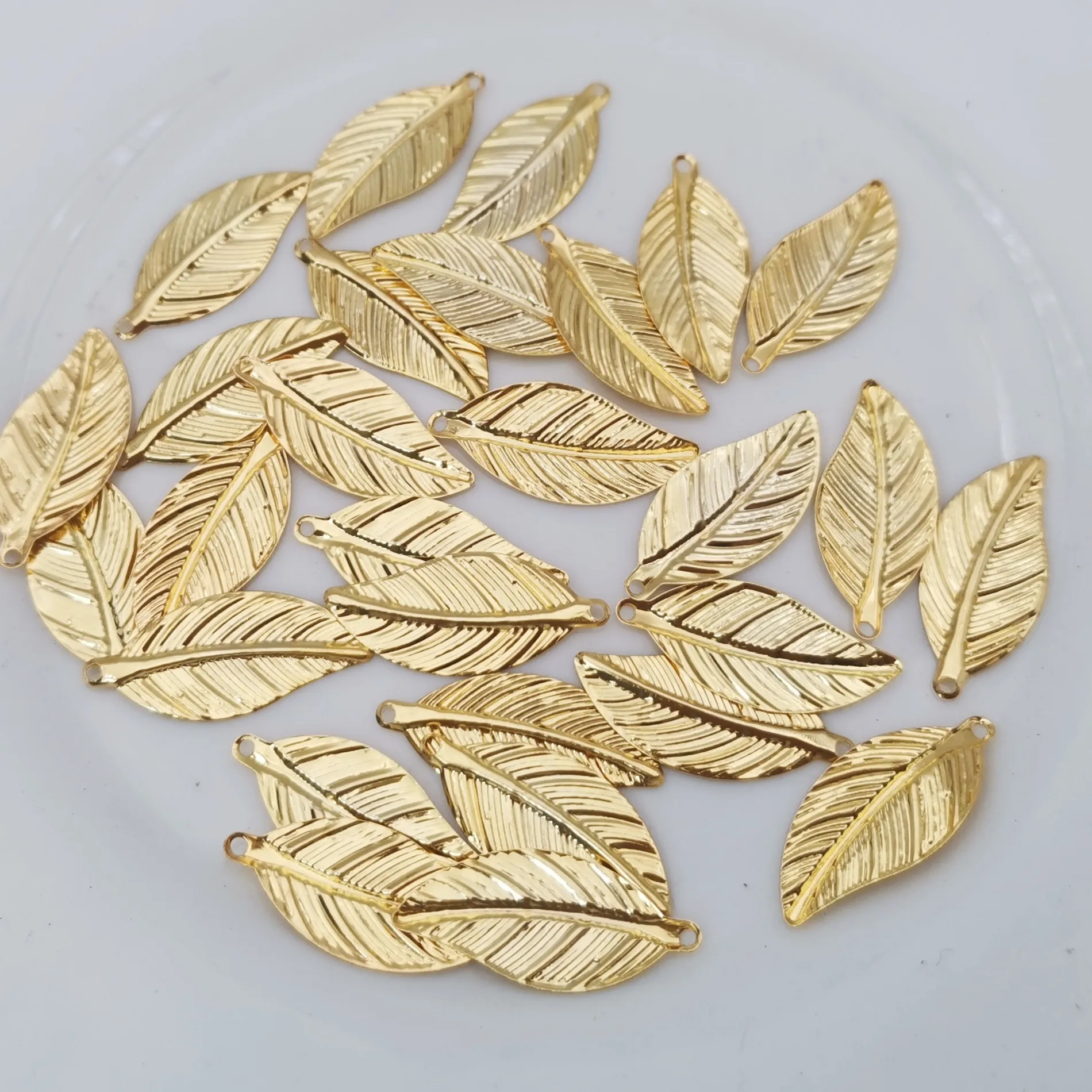 Authentic 50/200 pcs/lot diy Jewelry Accessories 11*25mm Gold color Metal Filigree Leaves Flowers Slice Charms base Setting Making