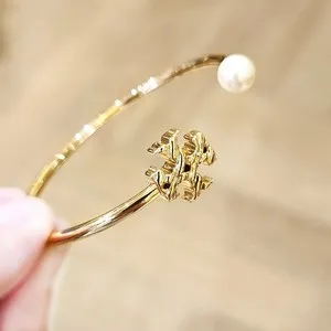 Authentic Tory Burch 18K Gold Plated Textured Rope Logo Pearl Flex Cuff Bracelet 164153