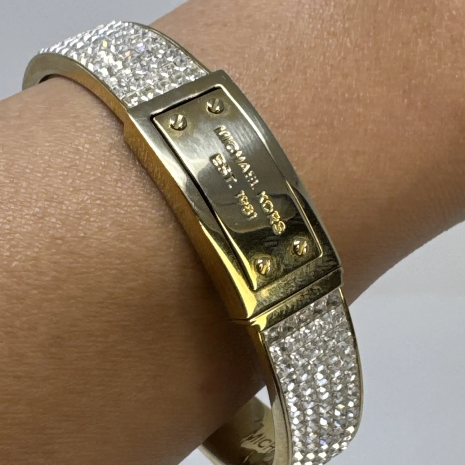 Authentic Embracing Elegance with Golden Radiance: Michael Kors Oval Logo Bangle