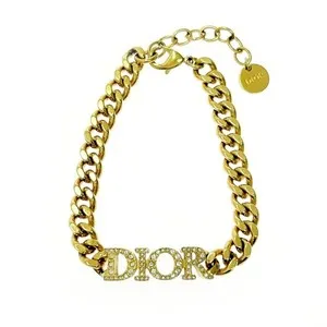 Authentic Christian Dior Gold Plated/Rhinestone Diorvolution logo bracelet gold 414238...