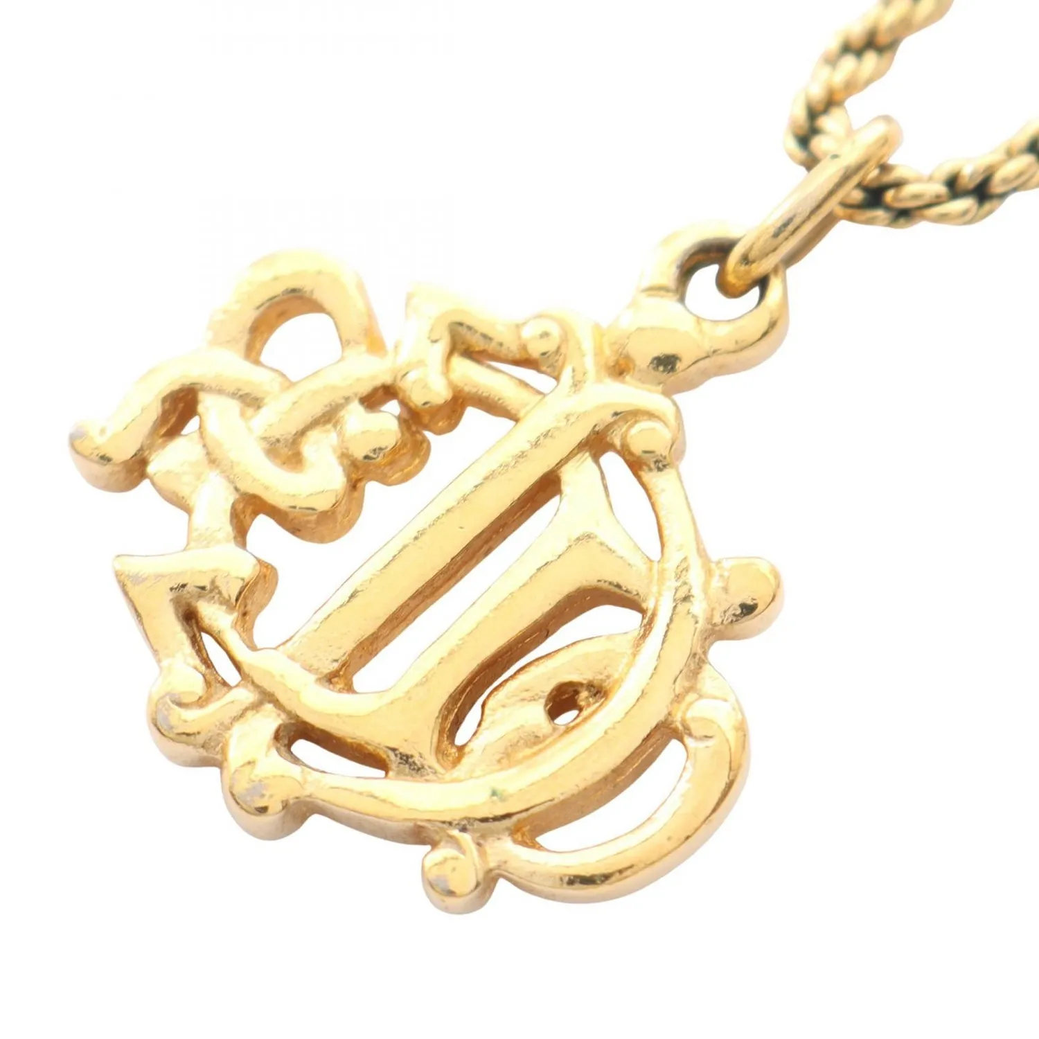 Authentic The Gilded Monogram Talisman of Christian Dior