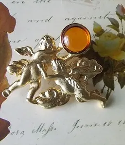 Authentic VINTAGE LOUIS STERN SIGNED LS AMBER CABOCHON GOLD PLATED METAL CHERUB BROOCH