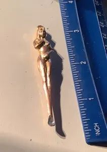 Authentic The Ethereal Muse: A 1960s Golden Figural Talisman