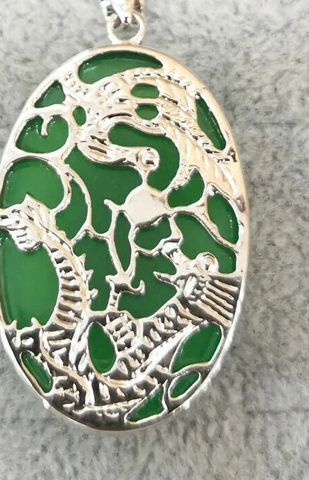 Authentic Celestial Harmony: The Dragon and Phoenix Gold-Plated Sun Talisman