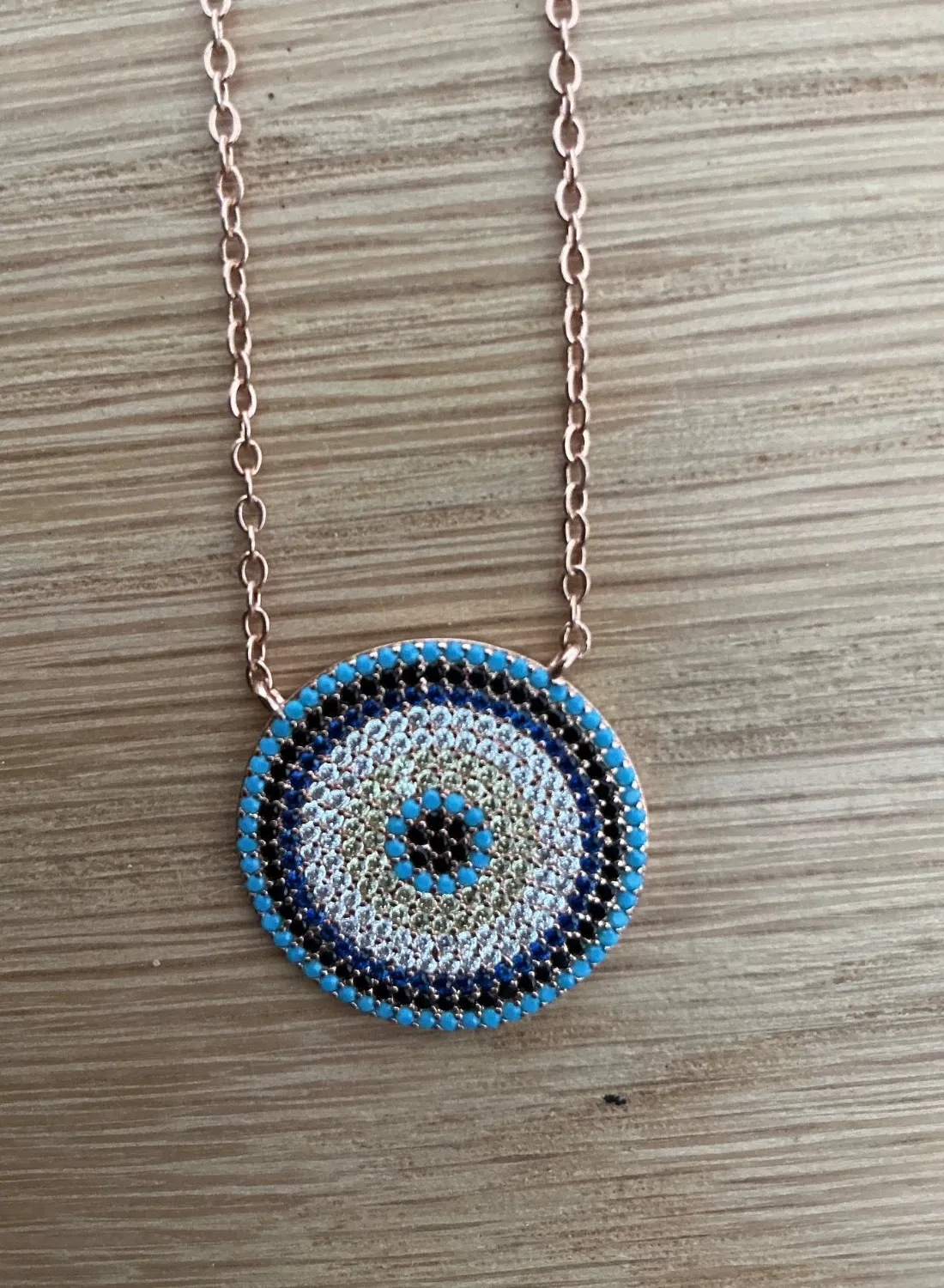 Authentic Rose Gold Plated Embellished Evil Eye Necklace Featuring Circular Pendant