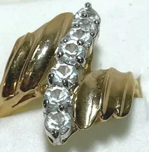 Authentic Gorgeous Waterfall Ring 7 ZC's  framed with gold plated metal size 5.25