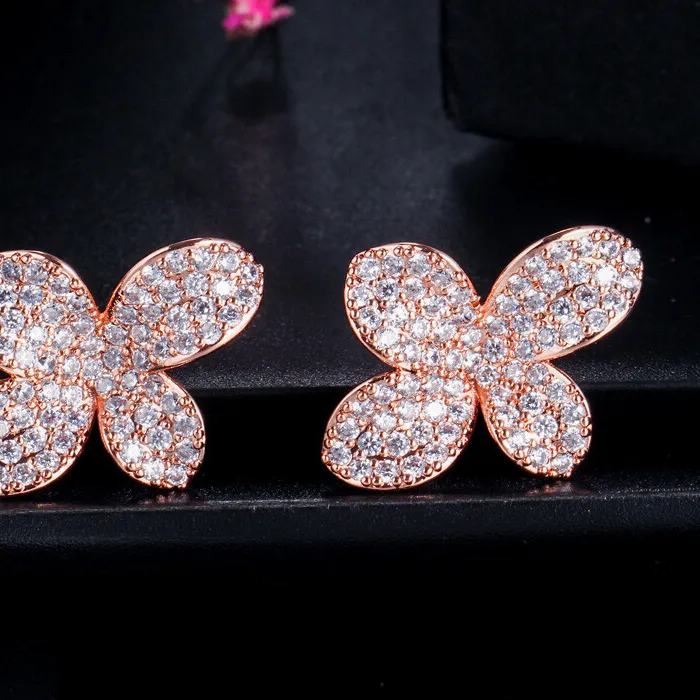 Authentic Enchanted Rose‑Gold Blossom Leaf Studs – Mystic Sparkle