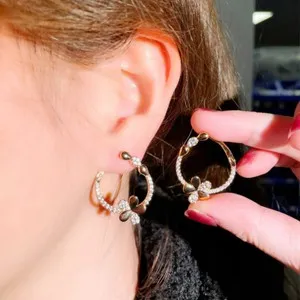 Authentic Twisted Golden Bloom Huggie Hoops of Celestial Light
